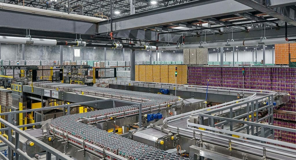 Processing area for beverage bottling and distribution facility